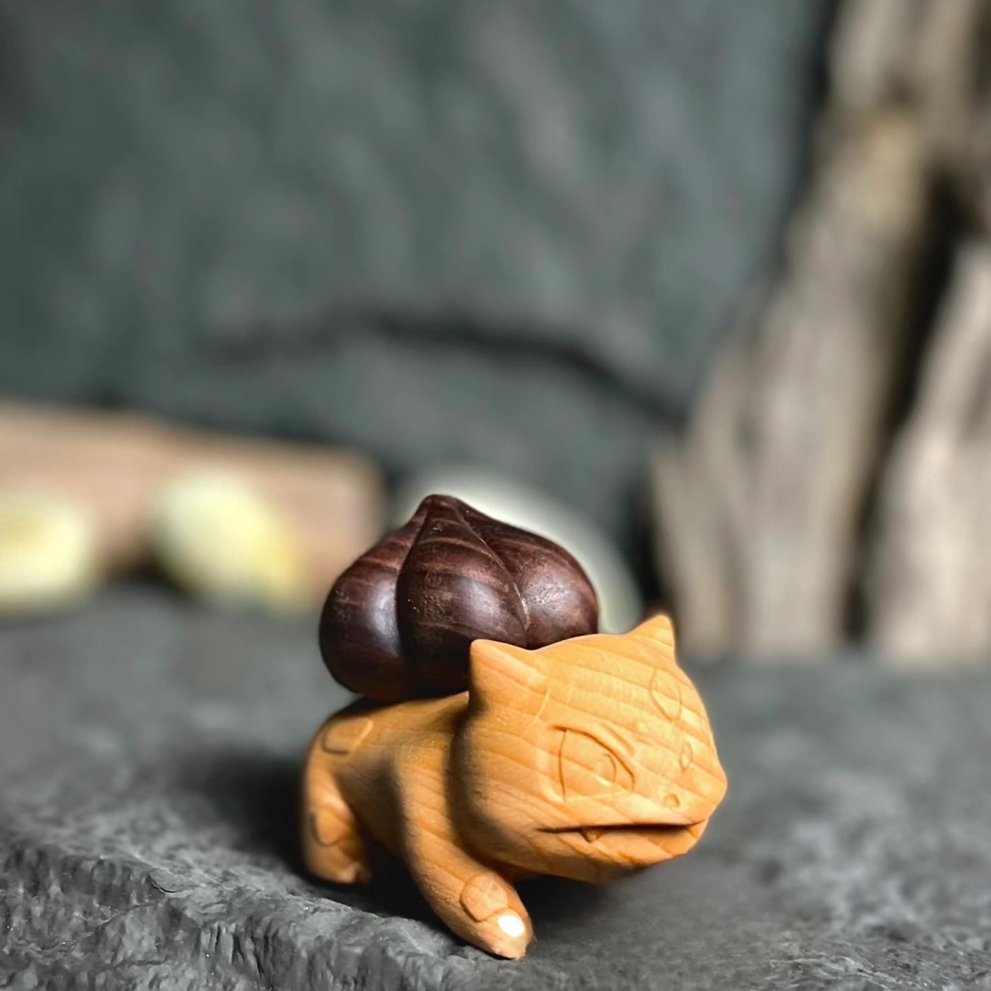 Wooden figurine of a dinosaur planter