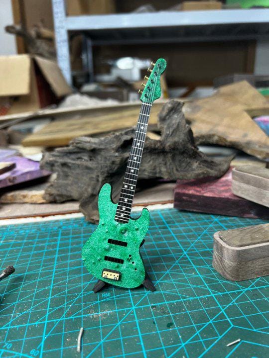 Green miniature guitar 