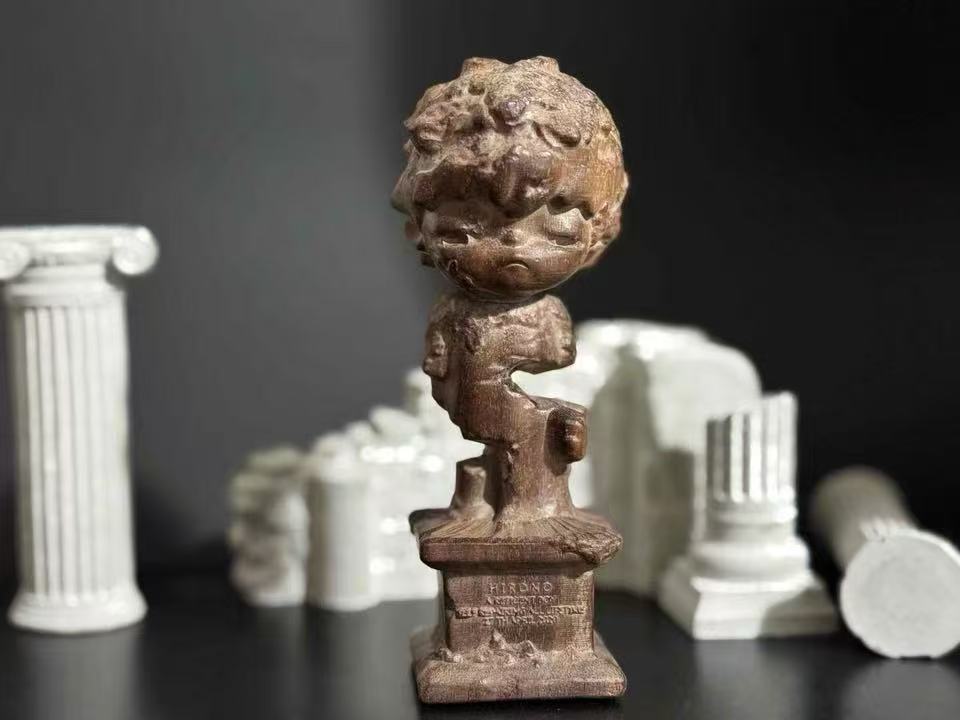 Hand-Carved Wooden Little Boy Figurine with Sculpted Sand-Inspired Base