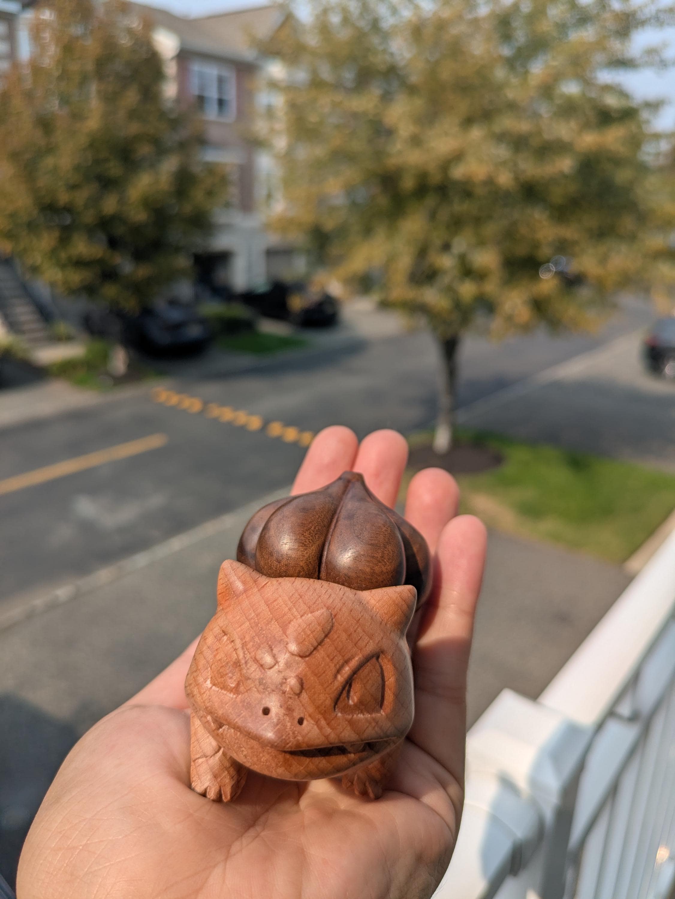 a small brown figurine shaped like a creature 