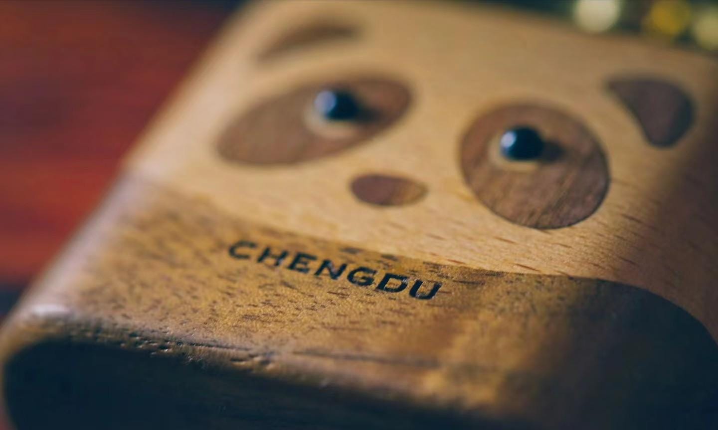 Wooden panda lighter with 'Chengdu' branding